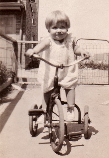 Mom on a tricycle around 1932.